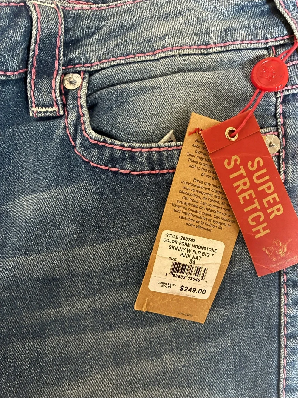 True Religion Mid-Blue Skinny Jeans with Pink Stitching